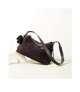 Dark brown suede shoulder bag for women, classic vintage underarm handbag with strap.