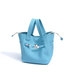 Light blue leather bucket bag for women, stylish top handle handbag with premium soft cowhide.