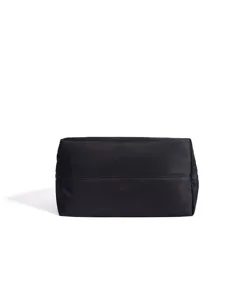 Minimalist black nylon tote bag detail view, casual large capacity travel shoulder handbag.