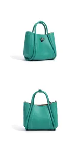 Elegante grüne Damentasche aus Leder, schicke Umhängetasche für Damen im Frühlingsalltag.