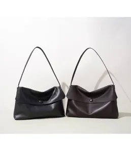 Minimalist genuine leather shoulder bag, versatile casual handbag detail view for daily wear.