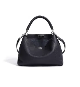 Bolso de mano de cuero negro con cierre giratorio y asa trenzada elegante para mujer