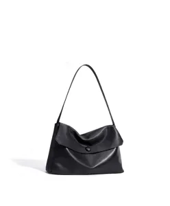 Classic black leather shoulder bag for women, minimalist daily handbag with strap.