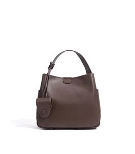 Retro minimalist women bucket bag detail view, casual commuter large capacity brown leather handbag.
