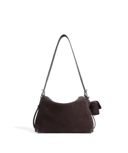 Brown suede shoulder bag detail showing soft texture, leather strap and side pouch accessory.