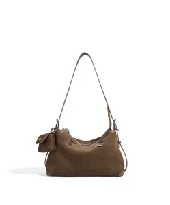 Brown suede shoulder bag detail, vintage hobo handbag with small pouch and metal hardware.