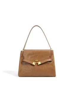 Sac à main élégant en cuir marron pour femme, design de niche pour sac bandoulière de travail.