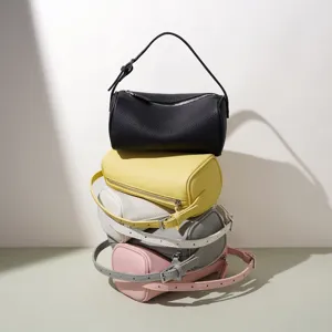 Sac a main cylindrique en cuir veritable elegance mode sacoche bandouliere multifonction