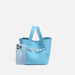 Blue genuine leather bucket tote bag with top handle and metal lock closure for women