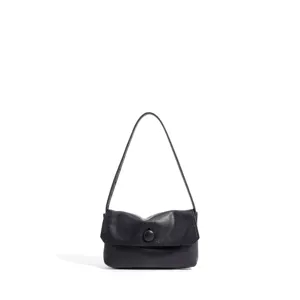 Black leather shoulder bag for women, elegant minimalist design with single strap and flap.