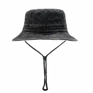 Vintage washed cotton bucket hat with chin strap for outdoor hiking and fishing use.
