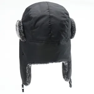 Black winter trapper hat detailed view, thick waterproof ushanka with soft fur earflaps.
