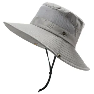 Detailed view of the grey sun hat featuring breathable mesh panel and adjustable chin strap.