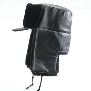 Black PU leather trapper hat detail shot, warm winter bomber hat with soft faux fur ear flaps.