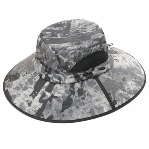 Detailed view of grey camouflage bucket hat featuring breathable mesh panel and adjustable drawstring.