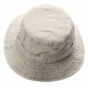 Detailed top view of a vintage washed cotton bucket hat in khaki, showing texture and stitching.
