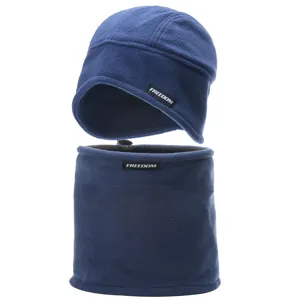 Detailed view of dark blue fleece winter hat and neck warmer set, soft and windproof fabric.