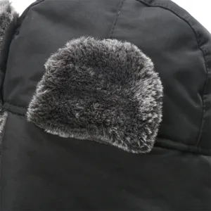 Black winter trapper hat detail, thick windproof ushanka with warm faux fur for outdoor cold.