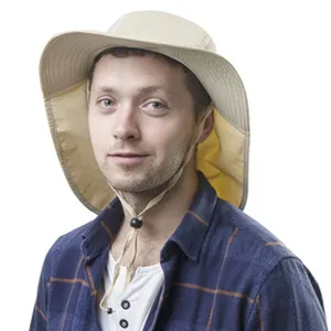 Detailed view of the beige outdoor sun hat with neck flap and adjustable chin strap.