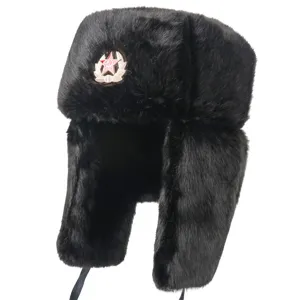 Black faux fur ushanka winter hat with Soviet red star badge for cold weather outdoor warmth.