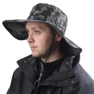 Close-up detail of gray camouflage sun bucket hat with neck flap and adjustable chin strap.