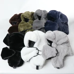 Faux rabbit fur ushanka hat detail showing multiple colors, thick earflaps and integrated winter mask.