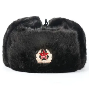 Close-up details of the black plush ushanka winter hat showing the iconic red star badge.