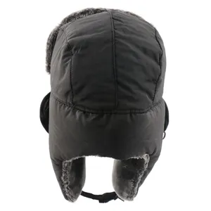 Detail view of the winter black ushanka hat showing thick faux fur lining and earflaps.