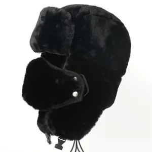 Detail shot of black faux fur ushanka hat featuring integrated earflaps and buckle.