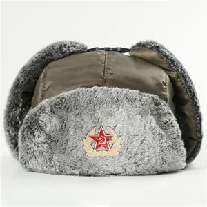 Soviet style winter trapper hat detail view, thick faux fur earflap warm outdoor cap.