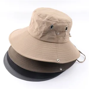 Outdoor waterproof quick-dry bucket hat detail, featuring breathable metal eyelets and cord.