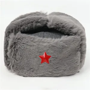 Grey winter ushanka hat with red star badge, faux fur thermal trapper cap for outdoor cold.