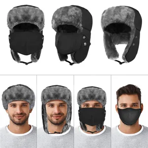 Windproof winter trapper hat with detachable mask and warm plush earflaps for cold weather.