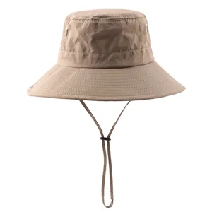 Outdoor bucket hat detail showing adjustable chin strap and breathable metal eyelets.