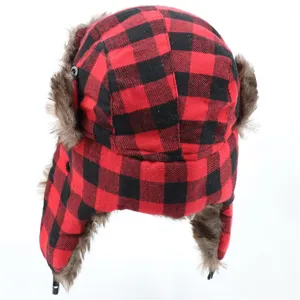 Classic red and black plaid trapper hat with warm faux fur ear flaps for winter outdoor.