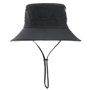 Black outdoor bucket hat detail view showing breathable metal eyelets and adjustable chin strap.