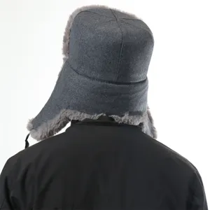 Winter warm grey trapper hat with cozy faux fur earflaps for outdoor snow cold protection.