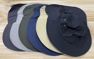 Detailed view of colorful outdoor sun hats with neck flap, showing breathable mesh and cord.