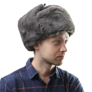 Grey faux fur ushanka winter hat with earflaps, thick thermal cold-weather cap for outdoor.