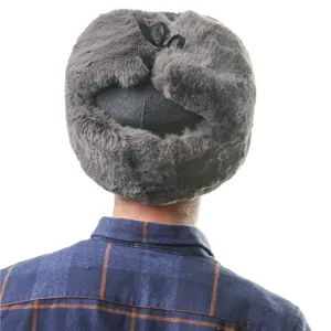 Detail view of a thick gray winter bomber hat with ear flaps, warm plush and wool fabric.