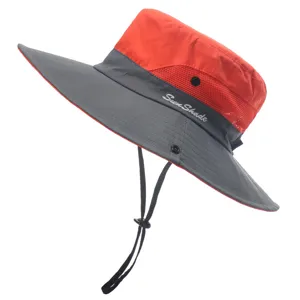 Detailed view of the kids outdoor sun hat with wide brim, breathable mesh and adjustable chin cord.