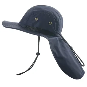Outdoor sun protection hat detail showing dark blue waterproof fabric, neck flap and mesh.