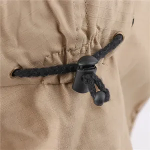 Close up detail of outdoor sun hat adjustable drawstring cord lock and metal eyelets.