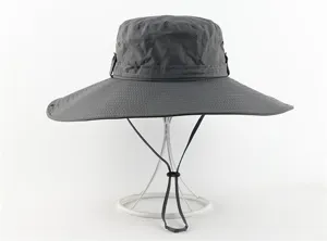 Unisex summer outdoor wide-brim waterproof sun protection fisherman hat in solid grey.