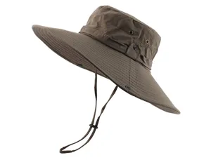 Close-up detail of the breathable wide brim sun hat, showing fabric texture and chin strap.