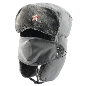 Detail shot of the grey winter ushanka hat with face mask and Soviet red star badge.
