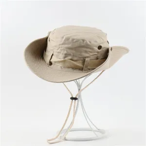 Khaki cotton outdoor bucket hat detail, adjustable chin strap, breathable metal eyelets.
