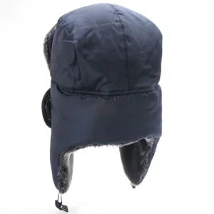 Detailed view of winter bomber hat in navy blue, thick windproof material with warm ear flaps.