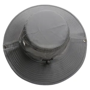 Detail view of gray wide brim sun hat, breathable mesh panels and adjustable cord toggle.