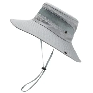 Detail shot of grey outdoor sun hat with breathable mesh band and adjustable chin strap.